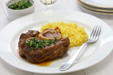Tra leggenda e storia. La nascita del risotto alla milanese 14 risotto alla milanese con ossobuco e1612047247157