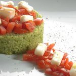 medaglioni di cous cous al pesto con pomodorini e taleggio DOP. Una ricetta estiva