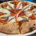 Il ristorante pizzeria mosso e la pizza inclusiva di Milano 9 Il ristorante pizzeria Mosso