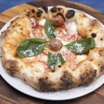 Il pizzaiolo Errico Porzio apre a Milano la sua nuova pizzeria: oltre 50 pizze da gustare! 10 Pizza Porzio