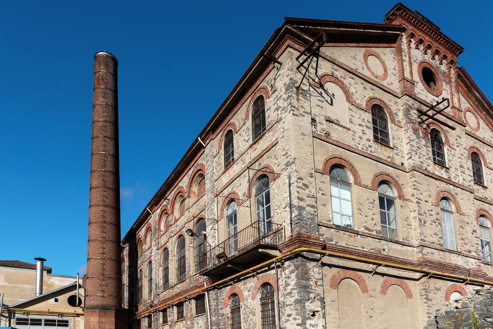 Biella tessile e gastronomia: il cuore dei telai e dei sapori locali 1 fabbrica-storica-tollegno-1900-biella-tessile