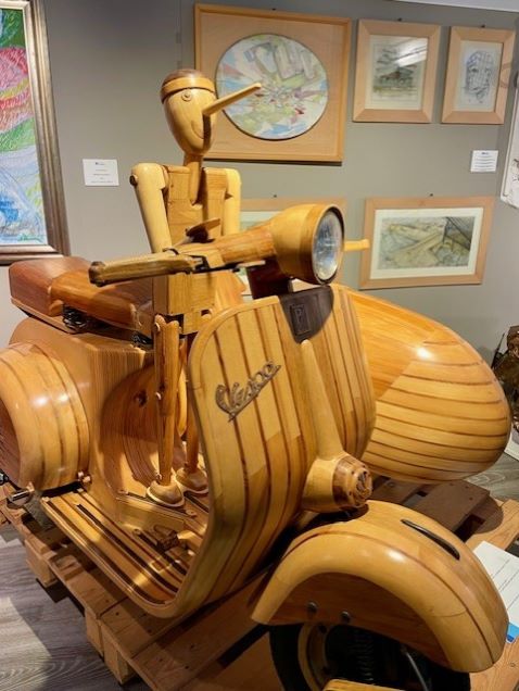 Al museo Piaggio vespa e pinocchio
